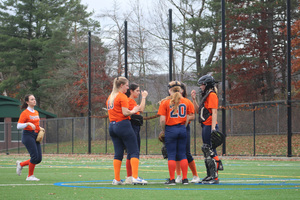 Syracuse club softball is entirely student-run, with the players paying for their own travel when on the road. To get through the season, they emphasize trust 